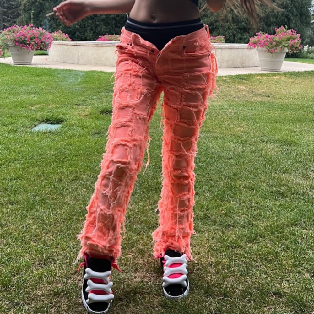 VALABASAS STACKED ORANGE JEANS